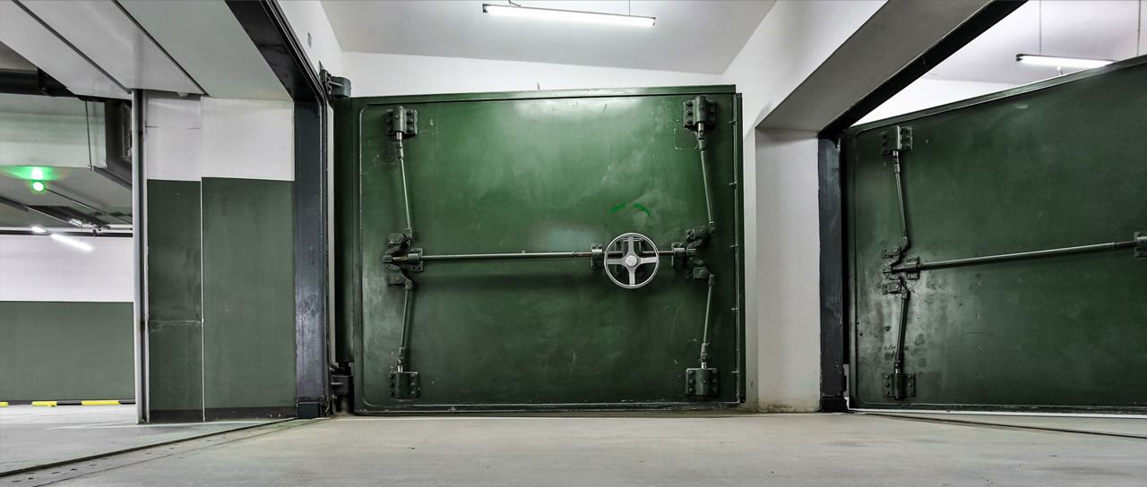 Blast-resistant cable and pipe seals for bunkers and bomb shelters