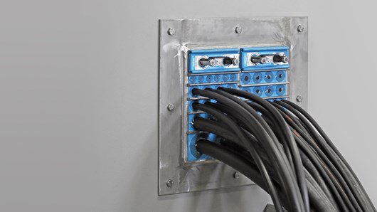 Fleksibelt system til tætning af kabelgennemføringer 